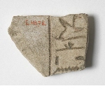 Fragment of a relief with inscription