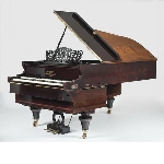 Double grand piano with reversed keyboards