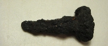 Fragment of an iron nail