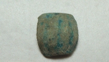 Fragment of a ribbed bead