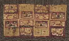 Fragment de textile au décor géométrique