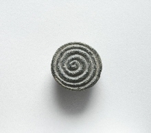 Cachet avec motif spirale