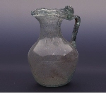 Small jar with spherical body and spout
