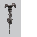 Sword handle with human and animal heads