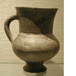 Cup with a handle and a foot