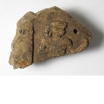 Fragment of a sculpture representing a figure holding out the left hand and wearing a sceptre in the right hand