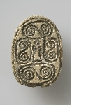Scarab with hieroglyphs and spirals