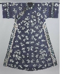 Dress in blue gauze fabric embroidered with butterflies